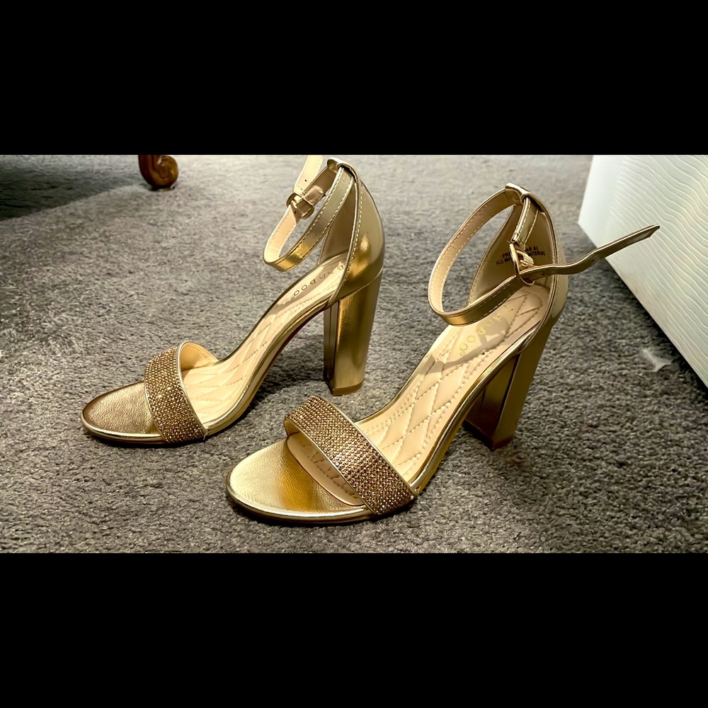 Gold heels never worn